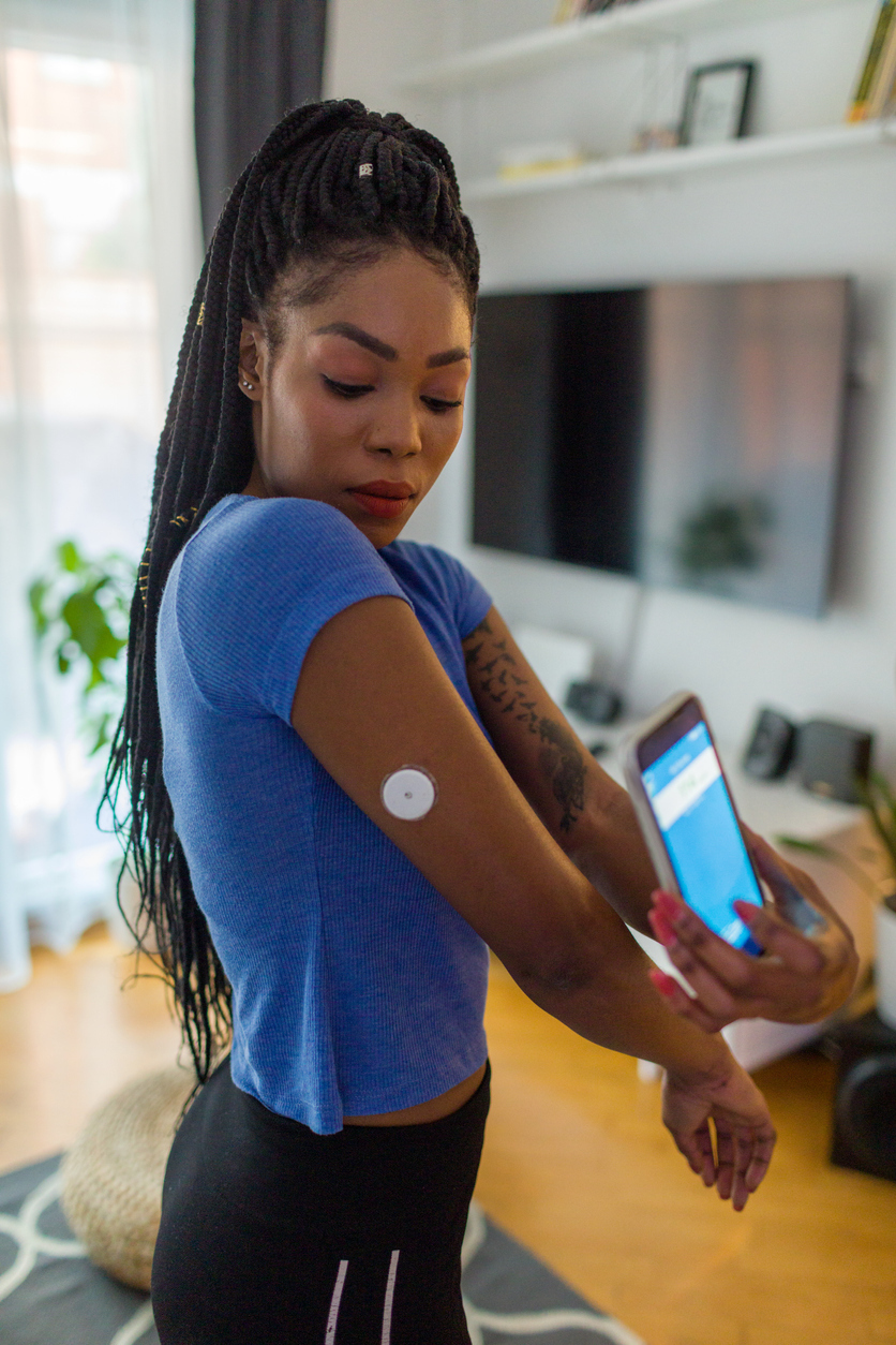 CGM Usage and Health Outcomes among People with T1D and COVID-19